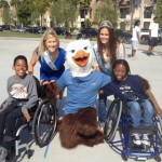 photo of Miss Mission Beach and 1st Princess with 2 of ASRA's junior athletes.